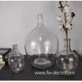 clear large round glass bottle vases